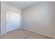 Bedroom featuring neutral carpet, closet, and bright lighting at 5412 Dalle Valley St, North Las Vegas, NV 89031