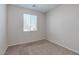 Bedroom featuring neutral carpet, and bright natural light from the window at 5412 Dalle Valley St, North Las Vegas, NV 89031