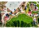 An aerial view of the community park with playground, basketball court, picnic area, and expansive green space at 5852 Brown Tree Ln, North Las Vegas, NV 89081