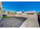 Backyard with gravel, rock and a paved patio at 5852 Brown Tree Ln, North Las Vegas, NV 89081