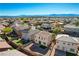 Spacious backyard featuring gravel, artificial turf, and ample space for outdoor activities at 5852 Brown Tree Ln, North Las Vegas, NV 89081
