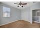 Bedroom featuring a ceiling fan and closet at 5852 Brown Tree Ln, North Las Vegas, NV 89081