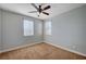 Bedroom with neutral walls, ceiling fan, and carpet at 5852 Brown Tree Ln, North Las Vegas, NV 89081