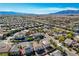Picturesque street view highlighting the community's expansive layout and scenic mountain backdrop at 5852 Brown Tree Ln, North Las Vegas, NV 89081