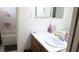 Bathroom with white countertop, sink, and mirror at 721 Bourbon St # F2, Pahrump, NV 89048