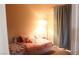 A bedroom featuring a cozy bed and ample natural light at 721 Bourbon St # F2, Pahrump, NV 89048