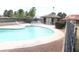 Community pool with in-ground hot tub and seating areas plus restrooms at 721 Bourbon St # F2, Pahrump, NV 89048