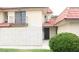 A two-story home features a private balcony and well-maintained landscaping at 721 Bourbon St # F2, Pahrump, NV 89048