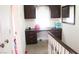 Landing with a built-in desk and drawers, illuminated by a window at 721 Bourbon St # F2, Pahrump, NV 89048