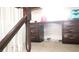 Upstairs landing area featuring a desk with drawers for organization and carpeted floors at 721 Bourbon St # F2, Pahrump, NV 89048