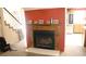 Comfortable living area featuring a fireplace, carpeted floors, and a warm ambiance perfect for relaxation and entertaining at 721 Bourbon St # F2, Pahrump, NV 89048