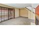 Bright living room with sliding glass doors to the patio and cozy fireplace at 721 Bourbon St # F2, Pahrump, NV 89048