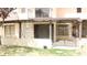 Covered patio area with sliding glass doors overlooking the fenced back lawn at 721 Bourbon St # F2, Pahrump, NV 89048