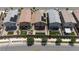 Aerial view of the backs of houses with some artificial turf and hardscape backyards at 7819 Rachelis St, North Las Vegas, NV 89084