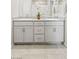 Elegant bathroom with double sinks, granite countertop, and modern fixtures; offers space and style at 7819 Rachelis St, North Las Vegas, NV 89084