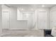 Upstairs landing featuring neutral carpet and paint, as well as convenient access to all rooms at 7819 Rachelis St, North Las Vegas, NV 89084