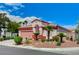 Desirable single-story home with a well-maintained front yard, mature trees, and desert landscaping at 8250 Lincoln Valley St, Las Vegas, NV 89123