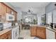 Kitchen with granite countertops, stainless appliances, open floor plan and dining area at 8250 Lincoln Valley St, Las Vegas, NV 89123