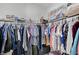 Large walk-in closet featuring built-in shelving and ample hanging space at 8250 Lincoln Valley St, Las Vegas, NV 89123