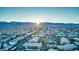 Expansive aerial view of the community with surrounding mountains in the distance at 8250 N Grand Canyon Dr # 2154, Las Vegas, NV 89166