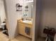 Bathroom featuring a vanity with a sink, mirror, and a toilet in a compact layout at 8250 N Grand Canyon Dr # 2154, Las Vegas, NV 89166