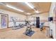 Community gym with new exercise equipment and neutral walls at 8250 N Grand Canyon Dr # 2154, Las Vegas, NV 89166