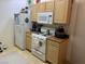 The kitchen features a gas range and microwave, plus plenty of storage at 8250 N Grand Canyon Dr # 2154, Las Vegas, NV 89166