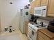 This kitchen boasts a gas range and refrigerator with plenty of storage space at 8250 N Grand Canyon Dr # 2154, Las Vegas, NV 89166