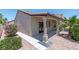 This home has a covered patio and easy-to-maintain desert landscaping at 8847 W Katie Ave, Las Vegas, NV 89147