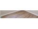 Corner of a room showing wood floors and white baseboards at 8847 W Katie Ave, Las Vegas, NV 89147