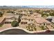 Aerial view of a beautifully landscaped home in a well-planned community with mountain views at 8953 Hitch Creek St, Las Vegas, NV 89131