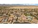 Overhead view of a suburban neighborhood near desert and mountains, blending community living at 8953 Hitch Creek St, Las Vegas, NV 89131