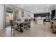 Dining area with patio access, featuring a smooth transition to a modern kitchen at 8953 Hitch Creek St, Las Vegas, NV 89131