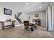 Open concept dining room with tile flooring, staircase access, and backyard patio access at 8953 Hitch Creek St, Las Vegas, NV 89131