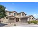 Spacious home boasting a three-car garage, charming curb appeal, and meticulous landscaping at 8953 Hitch Creek St, Las Vegas, NV 89131