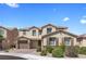 Inviting two-story home featuring neutral stucco, stone accents, and a two-car garage at 8953 Hitch Creek St, Las Vegas, NV 89131