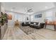 Comfortable living room featuring a large sectional sofa and neutral colored decor at 8953 Hitch Creek St, Las Vegas, NV 89131