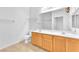 Bathroom with double sinks, a large mirror, and a separate shower at 8985 S Durango Dr # 1110, Las Vegas, NV 89113