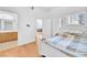 Bedroom featuring hardwood floors and access to an adjoining bathroom at 8985 S Durango Dr # 1110, Las Vegas, NV 89113
