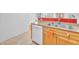 Kitchen features stainless steel sink, dishwasher, and oak-colored cabinets at 8985 S Durango Dr # 1110, Las Vegas, NV 89113