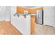 Kitchen includes a breakfast bar with counter seating and oak cabinets at 8985 S Durango Dr # 1110, Las Vegas, NV 89113