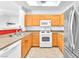 Well-lit kitchen includes stainless steel appliances and oak-colored cabinets at 8985 S Durango Dr # 1110, Las Vegas, NV 89113