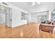 Open-concept living room with hardwood floors and access to the patio at 8985 S Durango Dr # 1110, Las Vegas, NV 89113