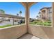Scenic view from the patio overlooking lush landscaping, nearby parking, and beautiful skies at 8985 S Durango Dr # 1110, Las Vegas, NV 89113