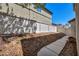 Backyard with white fence and trees at 9165 Starling Wing Pl, Las Vegas, NV 89143