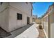 Backyard view with patio and fence at 9165 Starling Wing Pl, Las Vegas, NV 89143