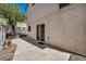 Backyard view with patio and partial view of trees at 9165 Starling Wing Pl, Las Vegas, NV 89143