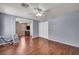 Bedroom with wood floors, cooling unit, and an attached lounge at 9165 Starling Wing Pl, Las Vegas, NV 89143