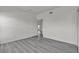 Bedroom features gray floors, white walls and doorway to next room at 9330 W Maule Ave # 212, Las Vegas, NV 89148