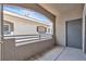 Open patio with views of the building exterior and blue sky at 9330 W Maule Ave # 212, Las Vegas, NV 89148